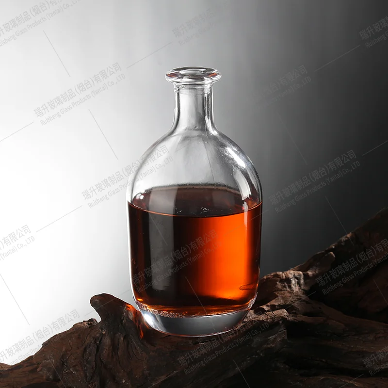 Existing Ruisheng glass spirits bottle photographed with amber liquid